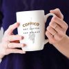 Woman-Holding-A-Coffee-Mug-Mockup-PSD.jpg1